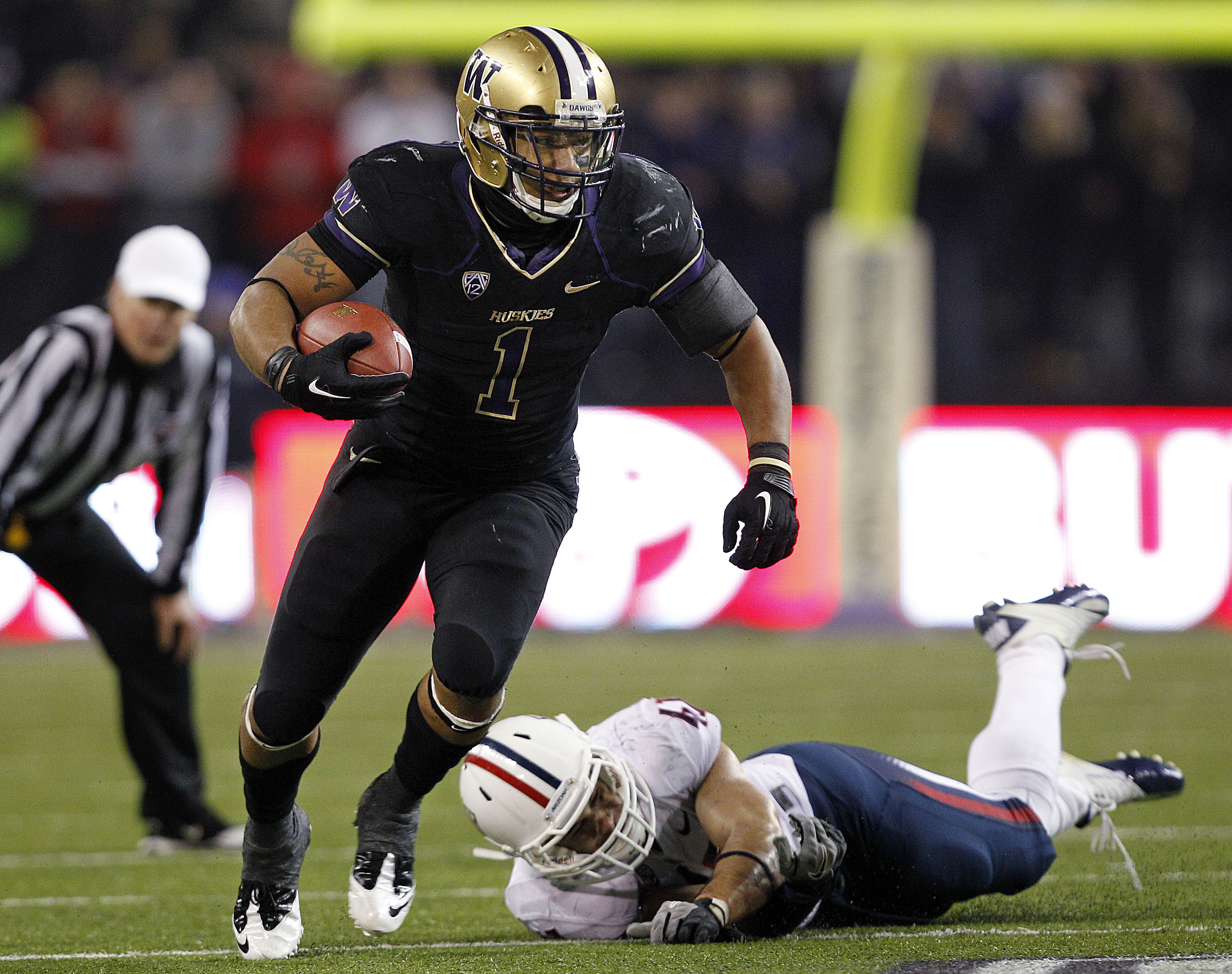 Huskies “corrieron” a Arizona