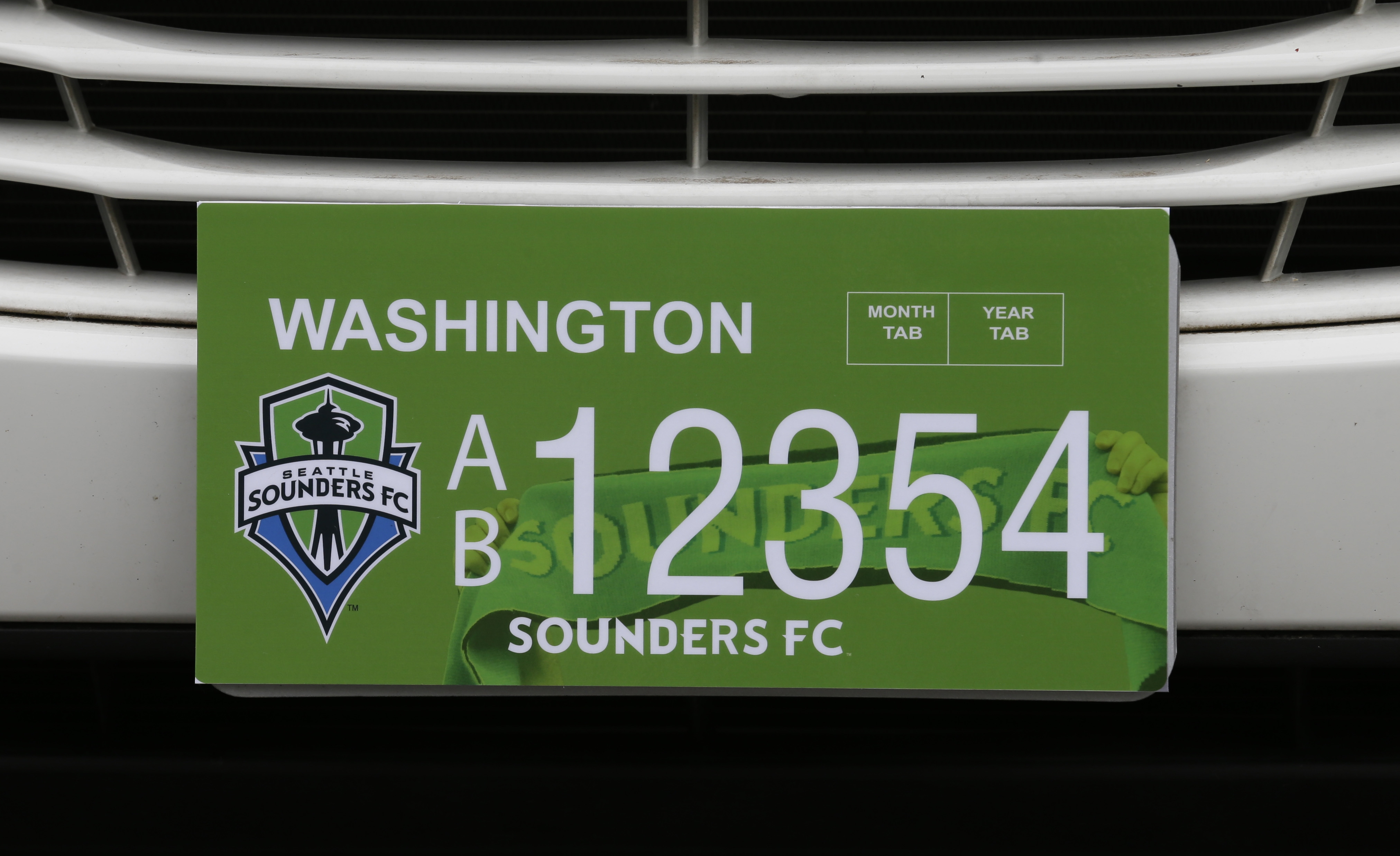 Placas de Seahawks y Sounders de venta en enero