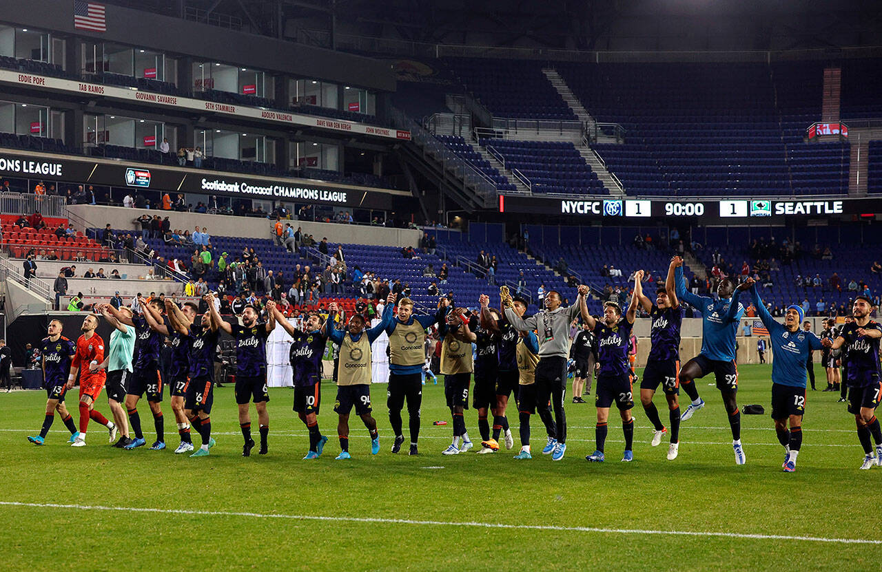 Apr 13, 2022; Harrison, NJ, USA; Seattle Sounders players acknowledge the crowd after the game against the New York City FC at Red Bull Arena. Mandatory Credit: Vincent Carchietta-USA TODAY Sports