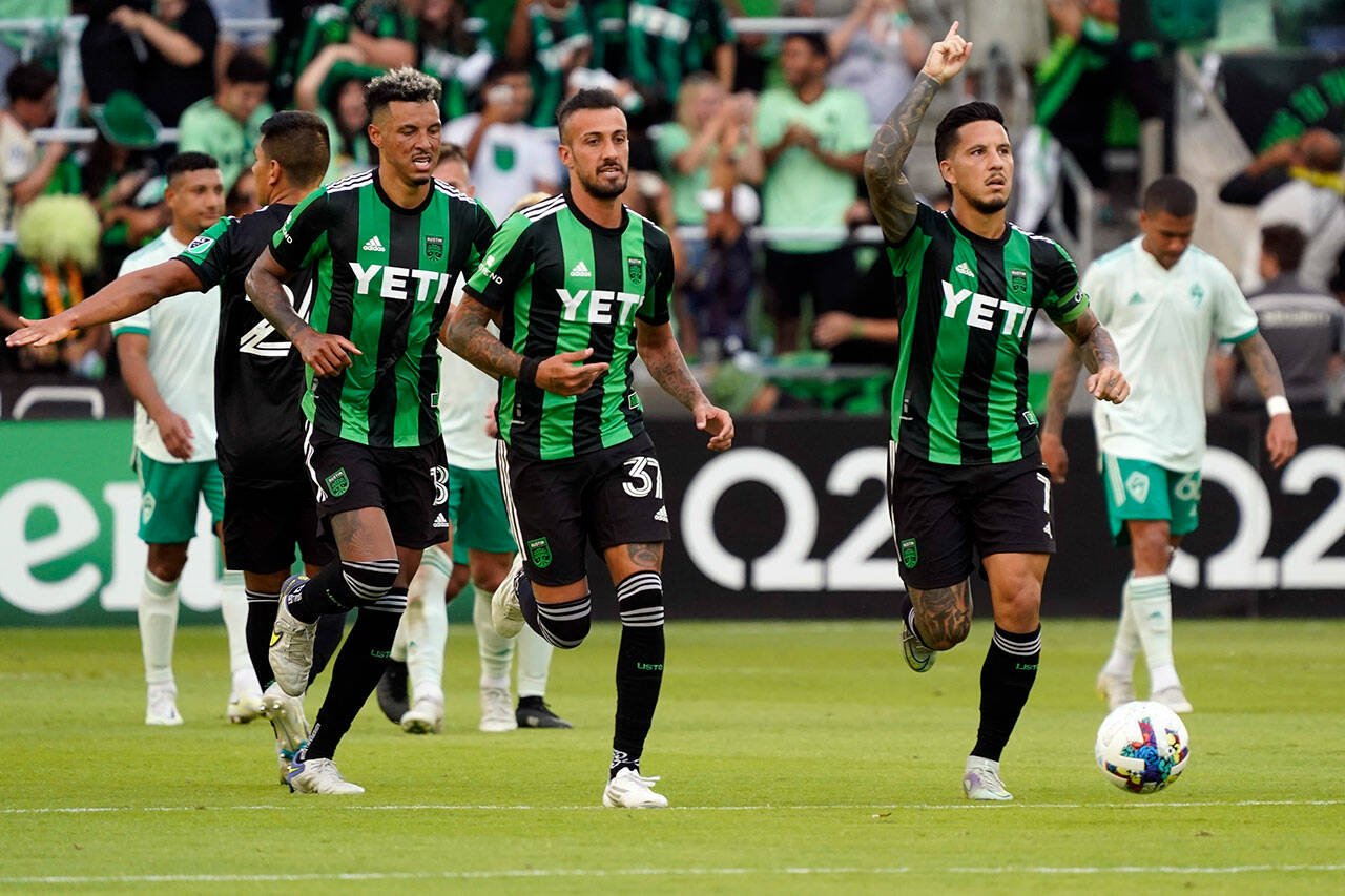 Oct 9, 2022; Austin, Texas, USA; Austin FC forward Sebastián Driussi (7) celebrates scoring a goal with teammates during the second half against the Colorado Rapids at Q2 Stadium. Mandatory Credit: Scott Wachter-USA TODAY Sports
