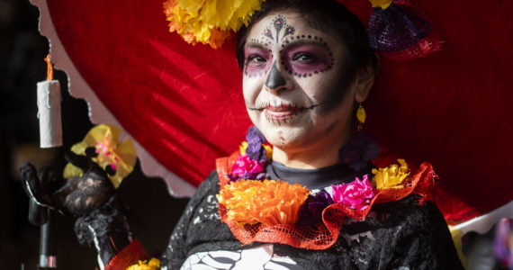 Silvia Rodriguez poses for a portrait on Saturday after winning best catrina at the Washington-Guerrero Foundation’s Día de los Muertos event at the Lynnwood Convention Center. (Olivia Vanni / The Herald)