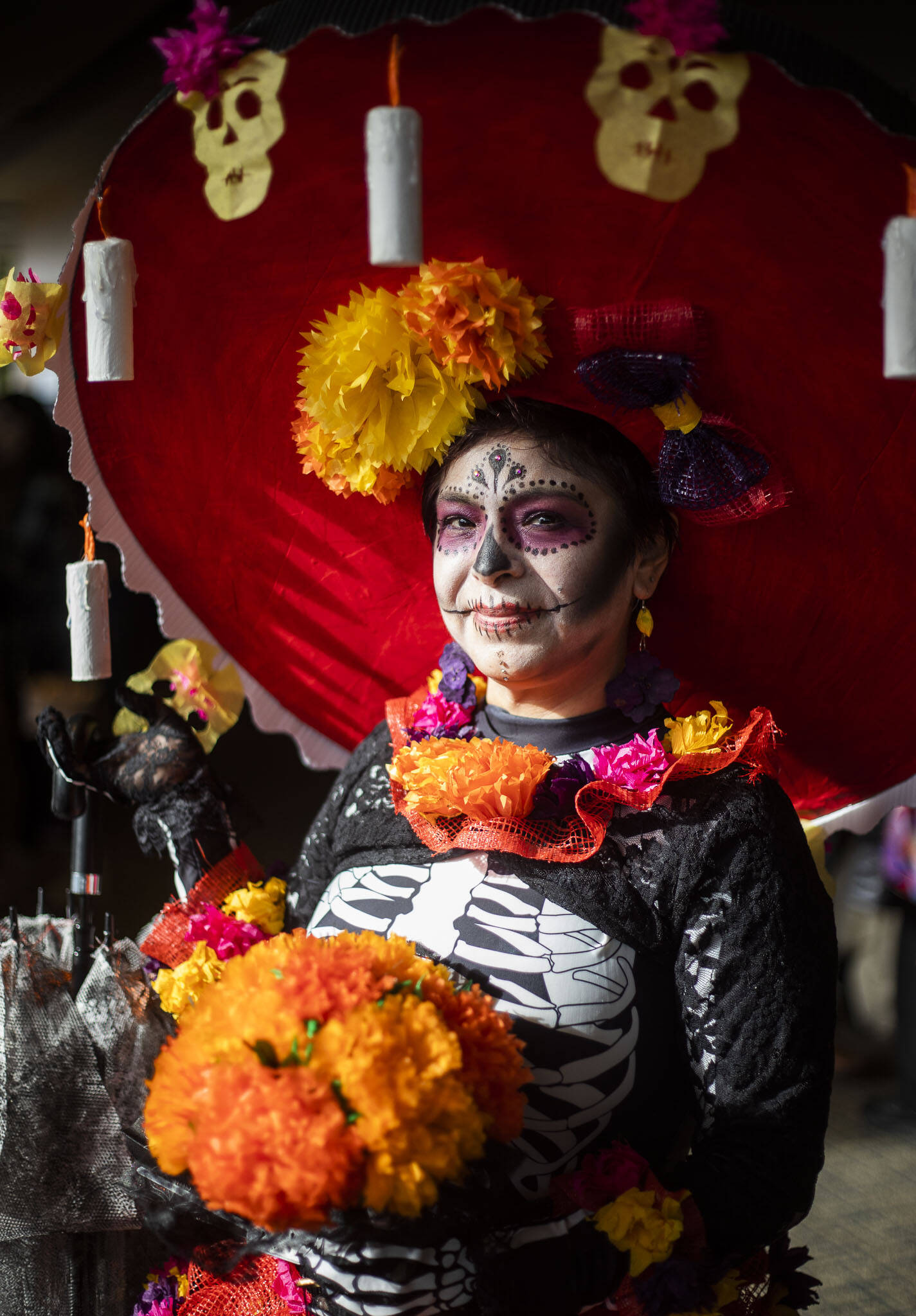 Silvia Rodriguez poses for a portrait on Saturday after winning best catrina at the Washington-Guerrero Foundation’s Día de los Muertos event at the Lynnwood Convention Center. (Olivia Vanni / The Herald)